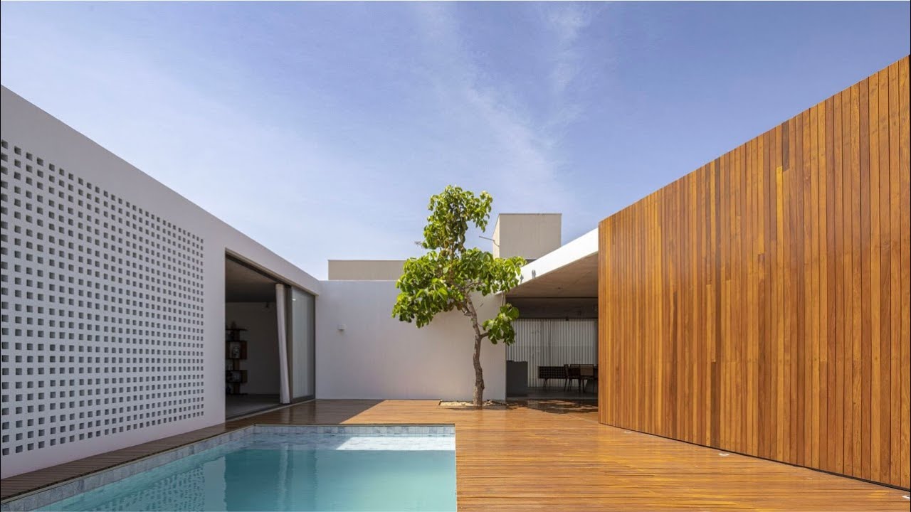 image 0 A Playful Single Storey House With Courtyards